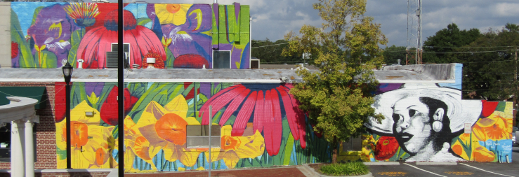 Flowers Divine is located on the side wall of Hapeville City Hall